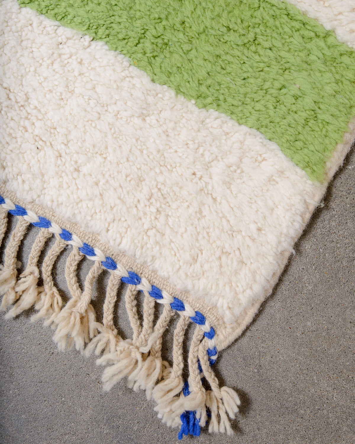 Modern, designer, handcrafted Berber rug from Morocco. Beniourain carpet with beautiful colours and patterns and fluffy wool texture.